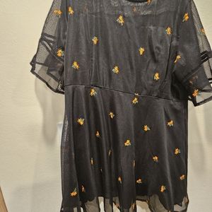 Dress with mesh overlay. Black with orange little flowers Size 4X